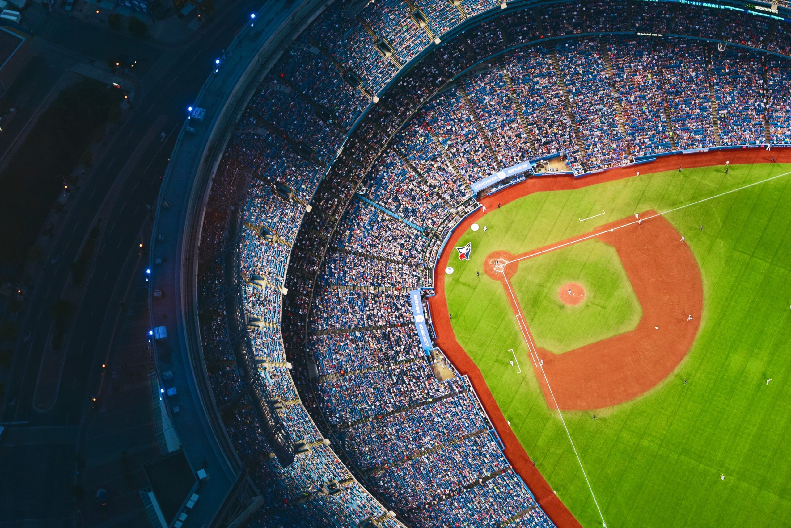 Overhead view of baseball field and stadium full of fans